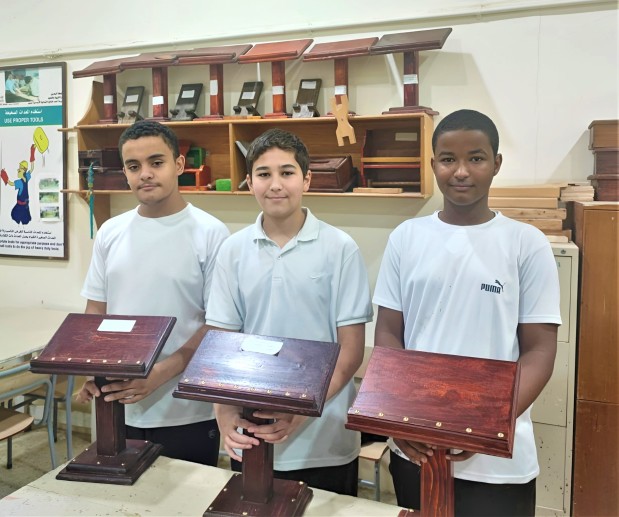 Students craft Quran stands